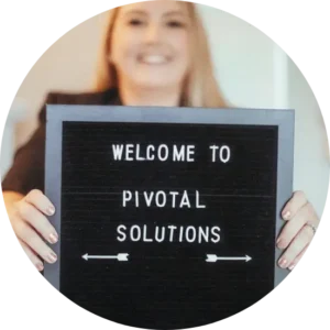 Briean-Clark-holding-welcome-sign